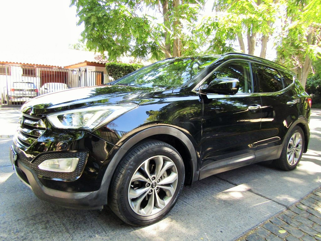 HYUNDAI SANTA FE 3.3 L  3 corridas 2013 cuero, sunroof panoramico. 1 dueño. Como nuevo.  - JULIO INFANTE